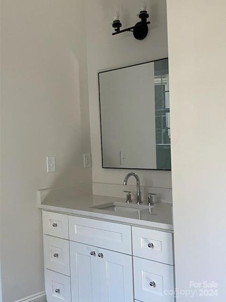 Primary Suite Vanity adjacent to shower