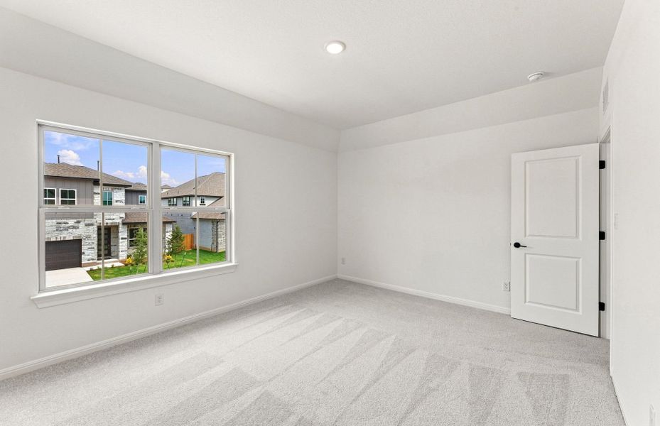 Spacious, unfurnished interior of a new home in Bluffview Reserve, Leander (Image 42).