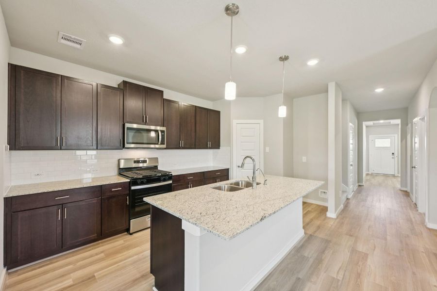 Furnished interior view inside a new home in Granger Pointe - Premier Series, Conroe (Image 3).