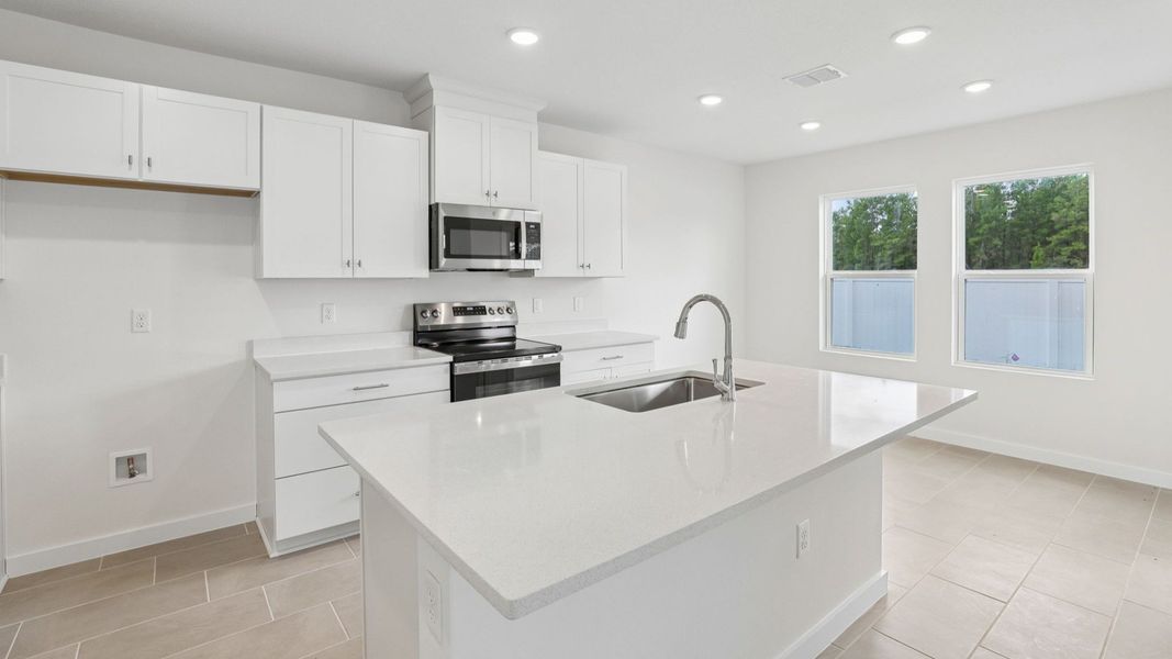 Furnished interior view inside a new home in Cyrene at Harmony, St. Cloud (Image 16).