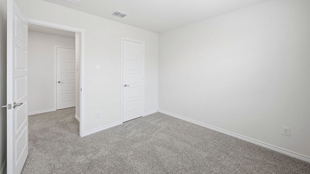 Spacious, unfurnished interior of a new home in Fireside by the Lake, Garland (Image 23).
