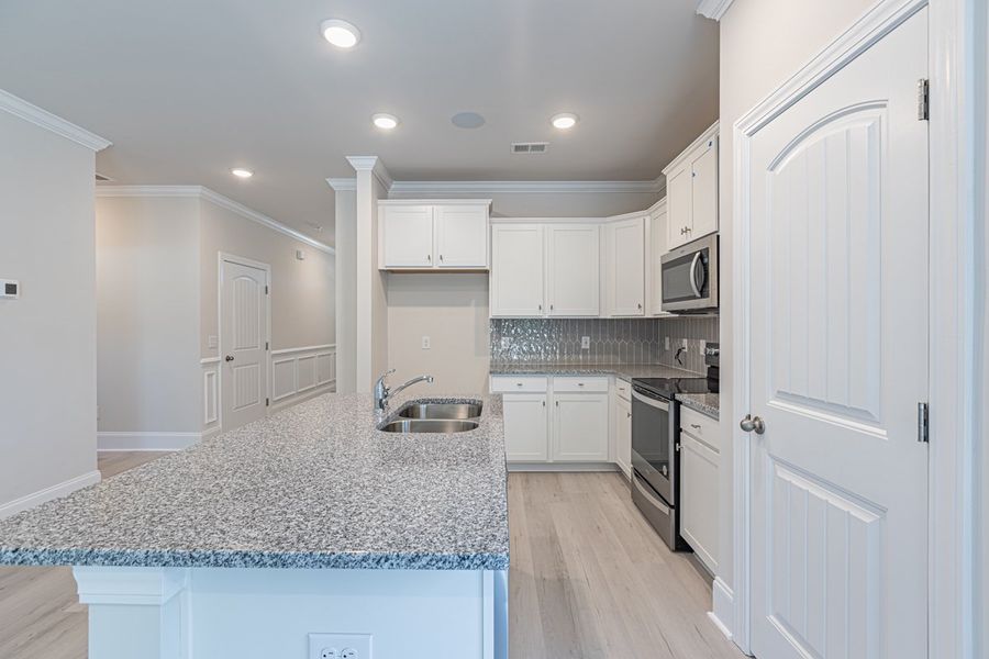 Representative furnished interior of a home built from the Habersham II by Great Southern Homes in Old Charleston Acres, Pelion (Image 8).