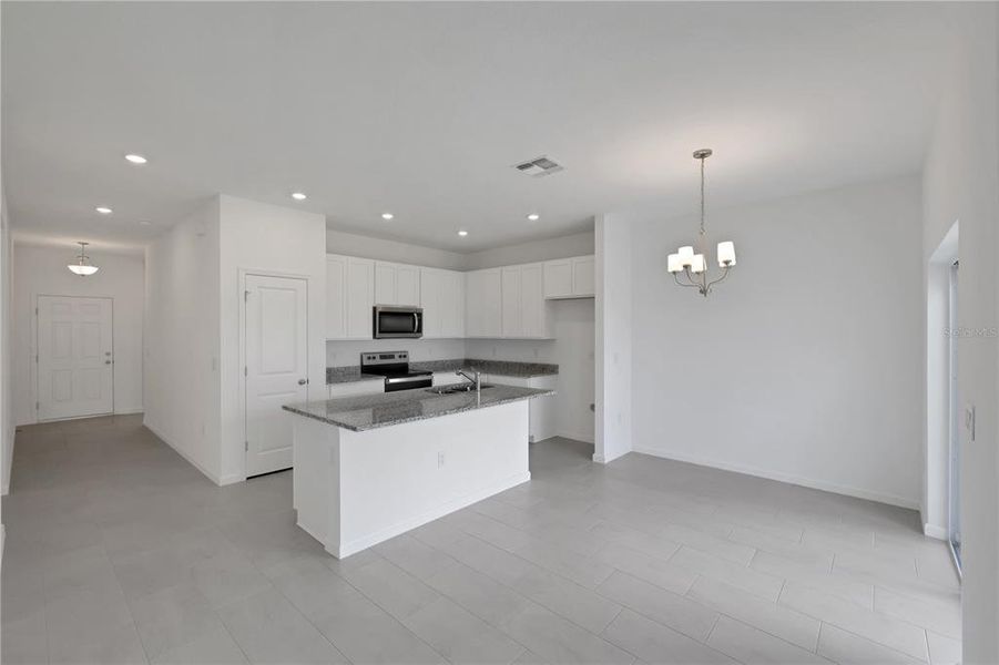 Furnished interior view inside a new home in Willowbrook North, Winter Haven (Image 2).