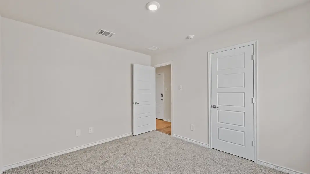 Spacious, unfurnished interior of a new home in Fireside by the Lake, Garland (Image 30).