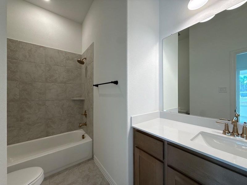 Full bathroom featuring shower / washtub combination and vanity