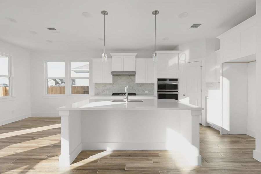Furnished interior view inside a new home in Enclave at Cele, Pflugerville (Image 6).