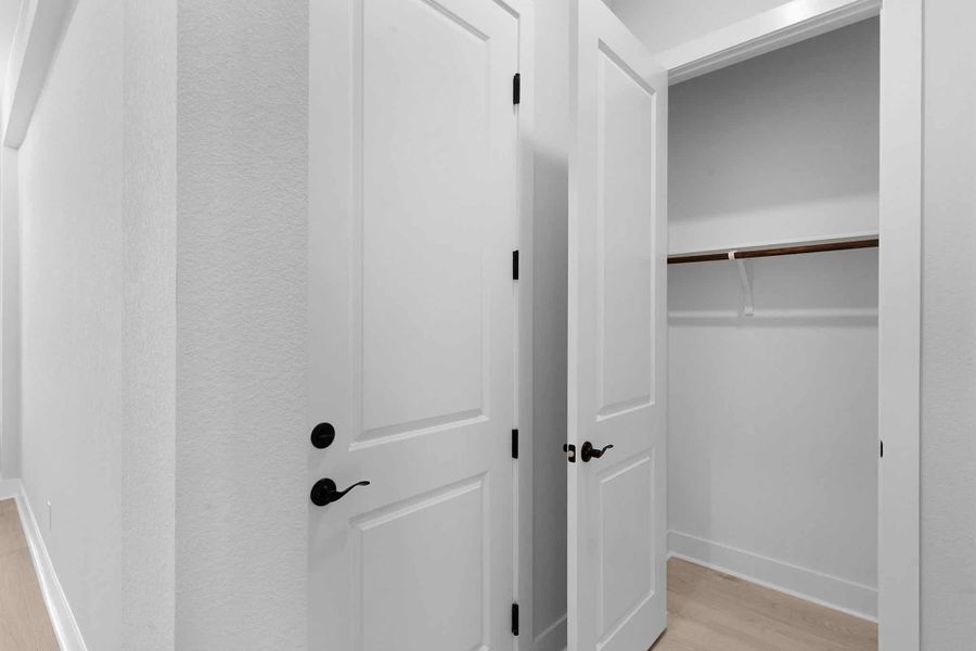 Spacious, unfurnished interior of a new home in The Grove at Blackhawk, Pflugerville (Image 38).