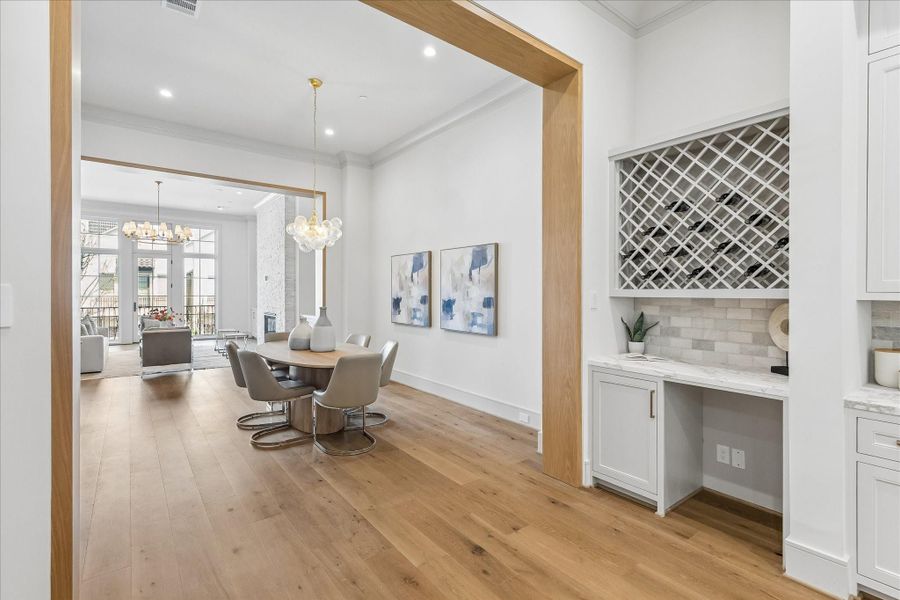 Between the dining room and the kitchen is a butler's pantry with a spot for the to-be-installed beverage cooler.
