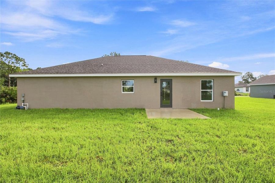 Exterior details and patio area of a home in , Sebring (Image 3).