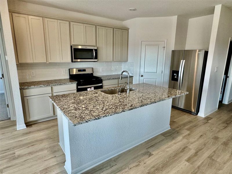 Furnished interior view inside a new home in Prairie Winds - Reserve Collection, Hutto (Image 4).