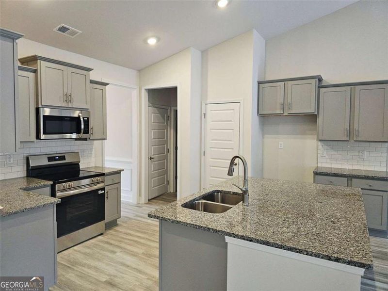 Furnished interior view inside a new home in Park Place, Bowdon (Image 3).