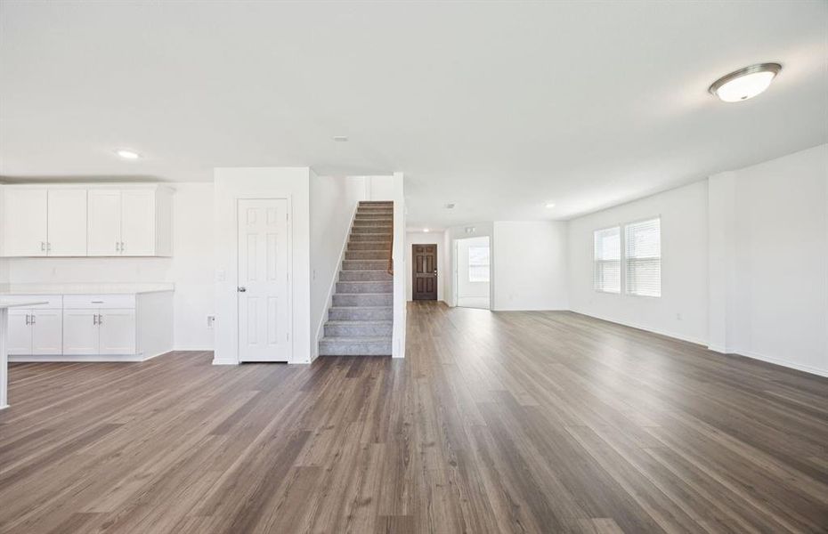 Bright and open gathering space with an adjoining nook Bright and open gathering space with an adjoining nook