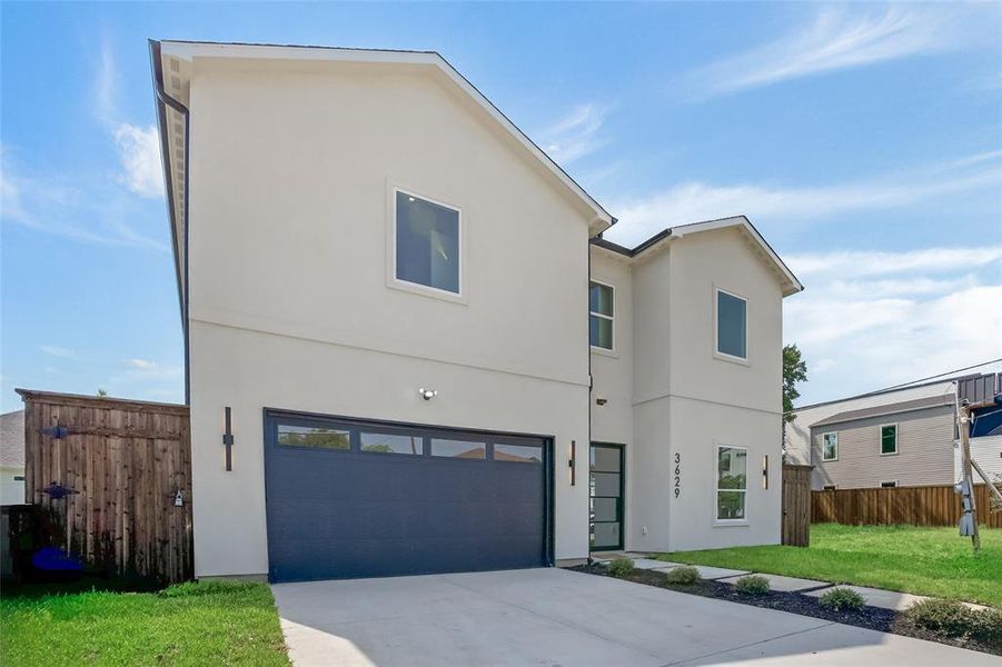 Front exterior of a new home in , Dallas, TX, highlighting curb appeal (Image 1). Front exterior of a new home in , Dallas, TX, highlighting curb appeal (Image 1).
