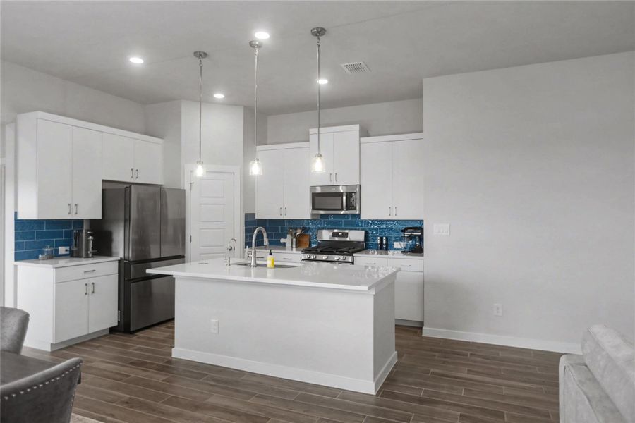 Furnished interior view inside a new home in August Fields, New Braunfels (Image 6).
