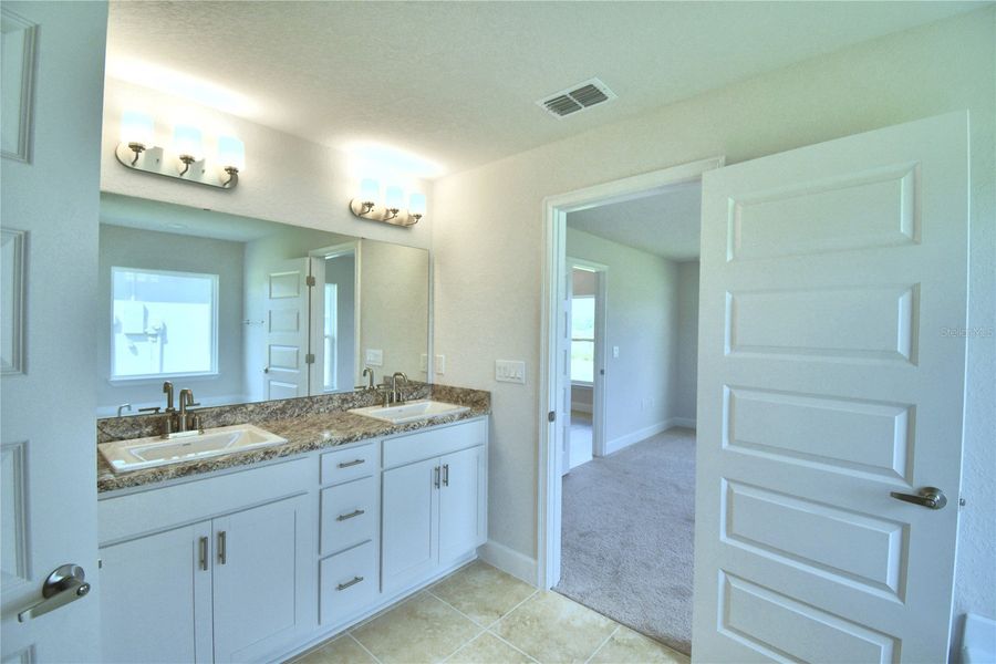 Furnished interior view inside a new home in Cadence Crossing, Auburndale (Image 14).