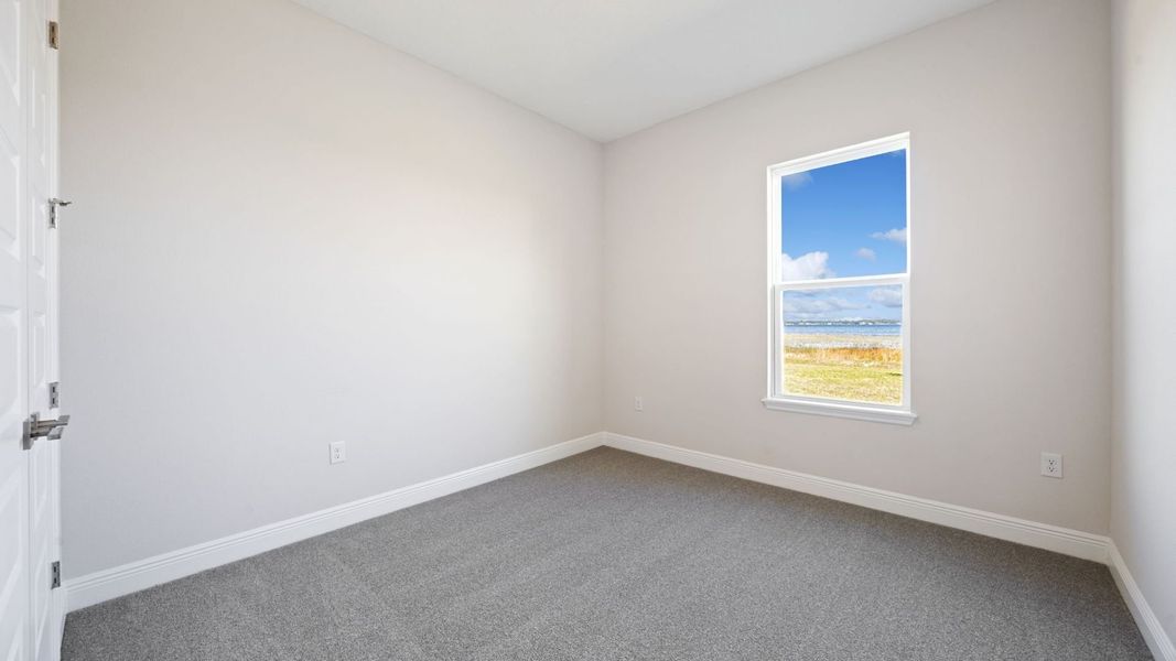 Representative unfurnished interior of a home built from the Everett by D.R. Horton in Buena Lago, St. Cloud (Image 25).
