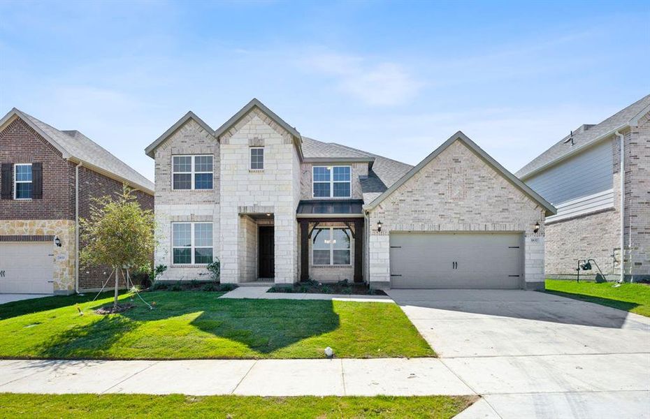 NEW CONSTRUCTION: Beautiful two-story home available at Wellington in Fort Worth