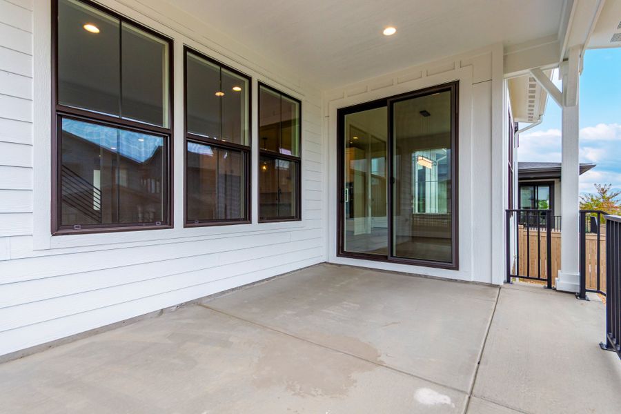 Exterior details and patio area of a home in West Grange, Longmont (Image 4).