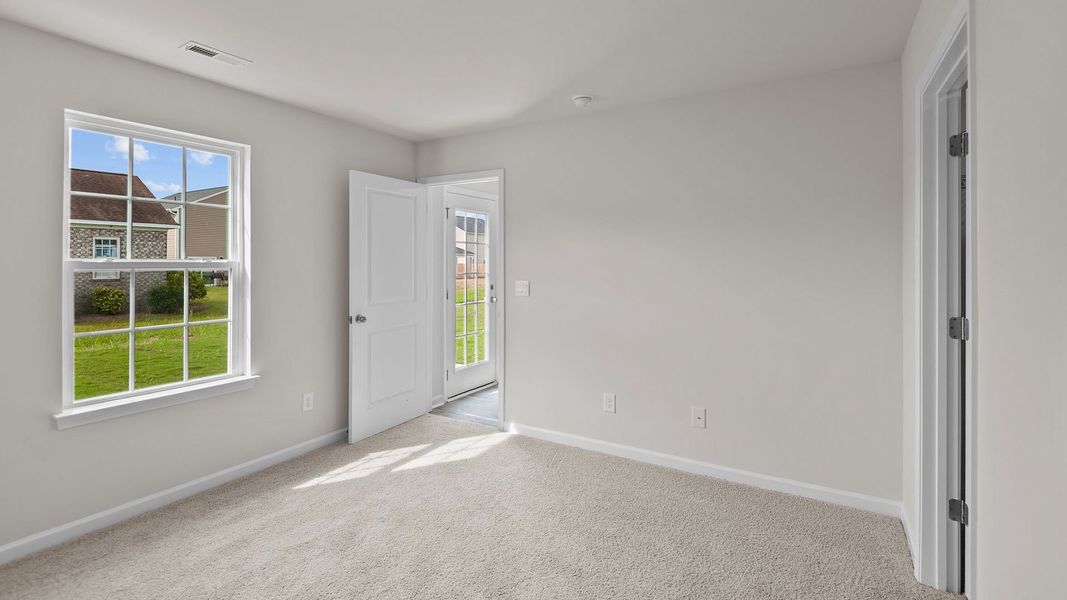 Spacious, unfurnished interior of a new home in Hobbs Farm, Ayden (Image 20).