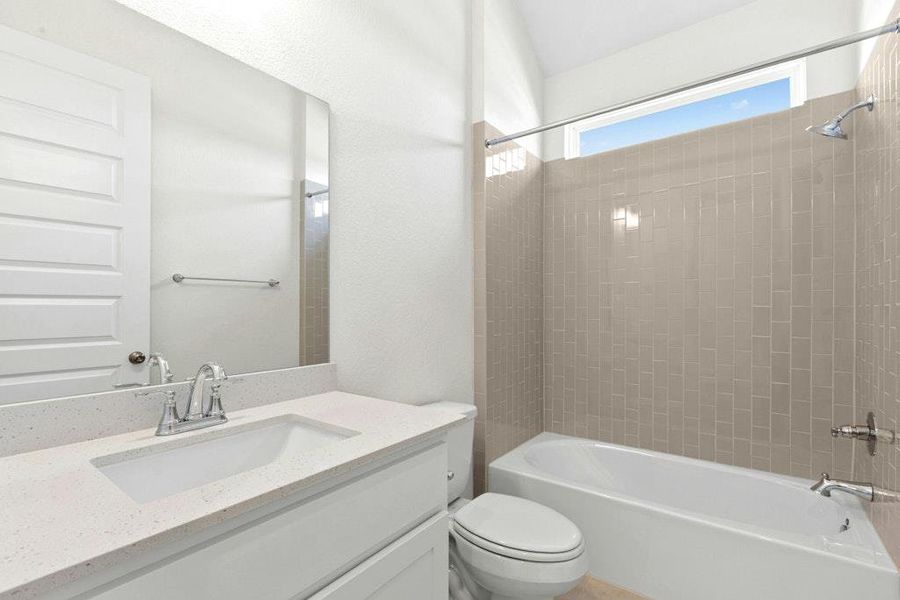 Furnished interior view inside a new home in University Heights, Round Rock (Image 5).