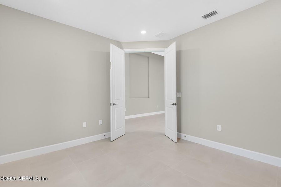 Spacious, unfurnished interior of a new home in Colbert Landings, Palm Coast (Image 35).