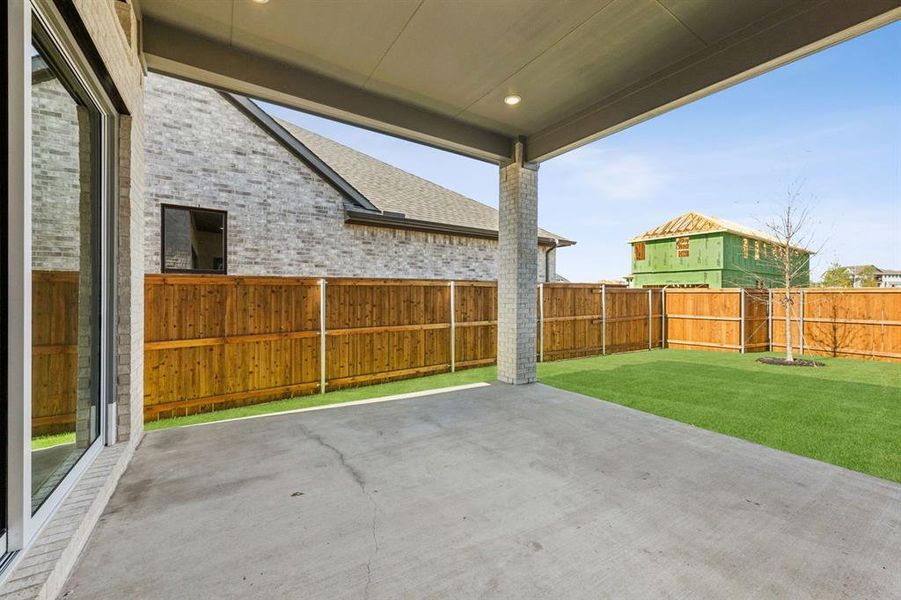 Exterior details and patio area of a home in The Grove Frisco, Frisco (Image 3). Exterior details and patio area of a home in The Grove Frisco, Frisco (Image 3).