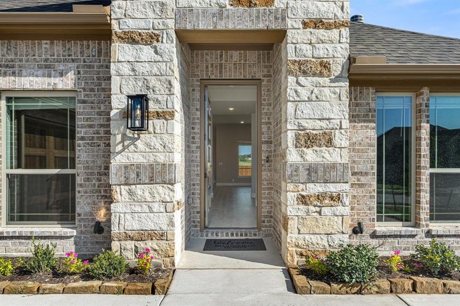 Exterior details and patio area of a home in The Grove, Midlothian (Image 15).