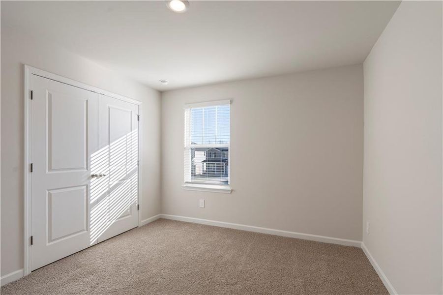 Spacious, unfurnished interior of a new home in Hamilton Crossing, Buford (Image 11).