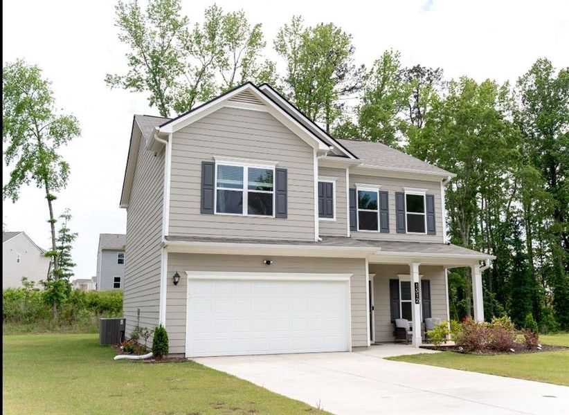 Front exterior of a new home in , Winder, GA, highlighting curb appeal (Image 19).