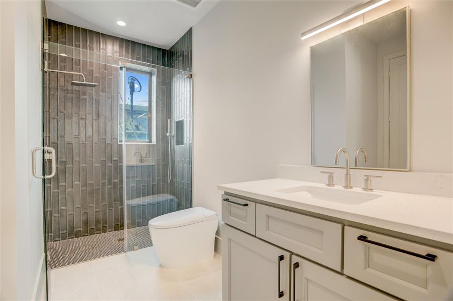 Ensuite bathroom associated with the second floor study/guest room.