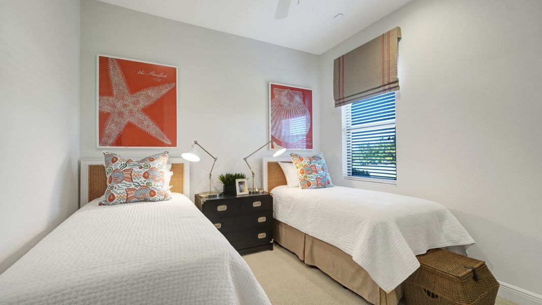 Representative furnished interior of a home built from the Sanibel 2 by Neal Communities in SkySail, Naples (Image 11).