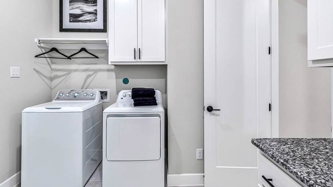 Furnished interior view inside a new home in Avalon at Cypress, Cypress (Image 14). Furnished interior view inside a new home in Avalon at Cypress, Cypress (Image 14).