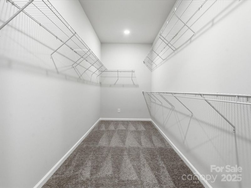 1 of 2 walk-in primary closets!