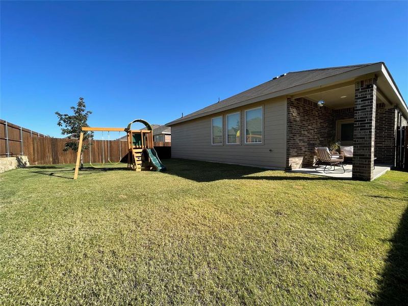 Exterior details and patio area of a home in Reatta Ridge: Classic Collection, Justin (Image 3). Exterior details and patio area of a home in Reatta Ridge: Classic Collection, Justin (Image 3).
