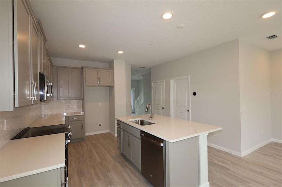Furnished interior view inside a new home in Center Lake on the Park, St. Cloud (Image 8).
