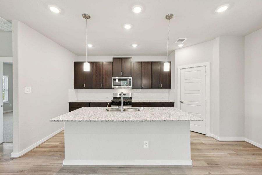 Furnished interior view inside a new home in Heights of Barbers Hill, Mont Belvieu (Image 8).