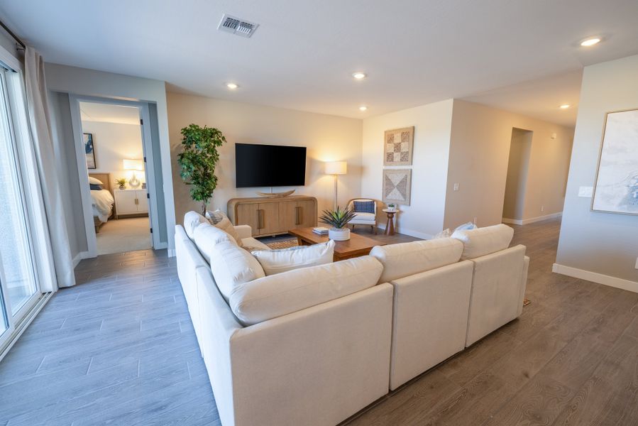Furnished interior view inside a new home in White Tank Foothills Signature Series, Waddell (Image 11). Furnished interior view inside a new home in White Tank Foothills Signature Series, Waddell (Image 11).