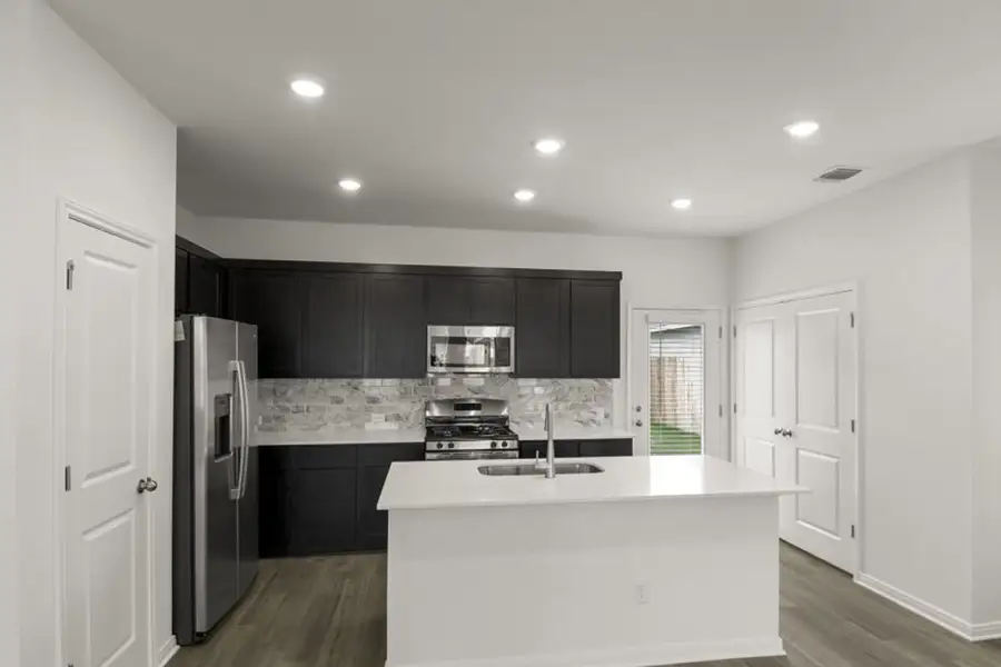 Representative furnished interior of a home built from the Elm by Pacesetter Homes in Blanco Vista, San Marcos (Image 13).