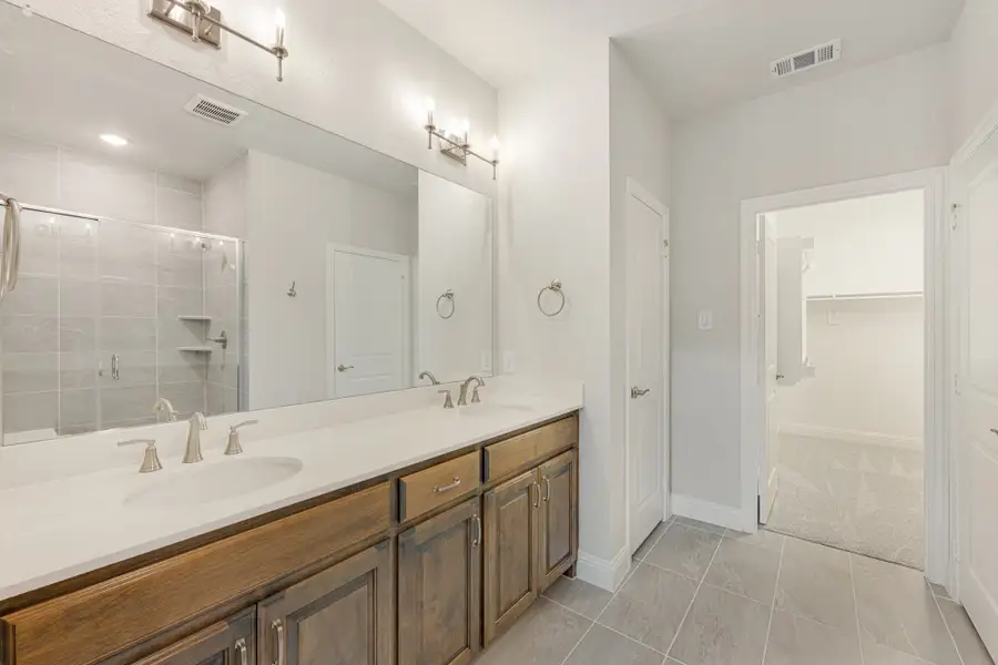 Furnished interior view inside a new home in Cottonwood Creek, Rowlett (Image 36).