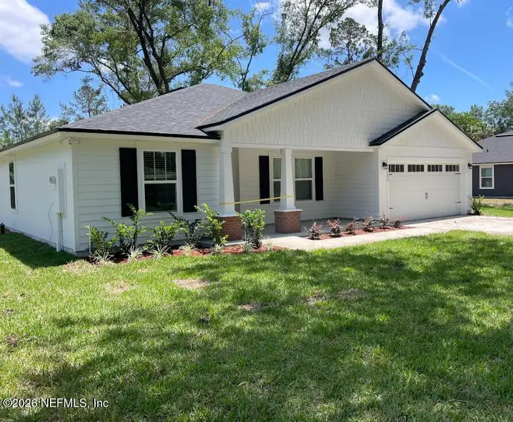 Front exterior of a new home in , Jacksonville, FL, highlighting curb appeal (Image 20).