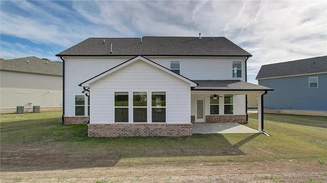 Exterior details and patio area of a home in Brighton, Locust Grove (Image 3).