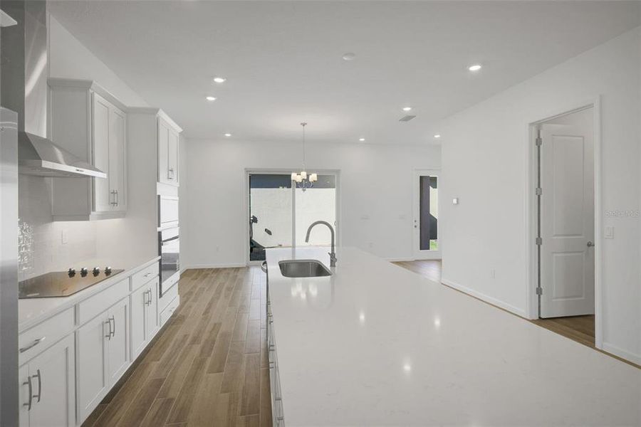 Furnished interior view inside a new home in Serenade at Ovation, Winter Garden (Image 14).