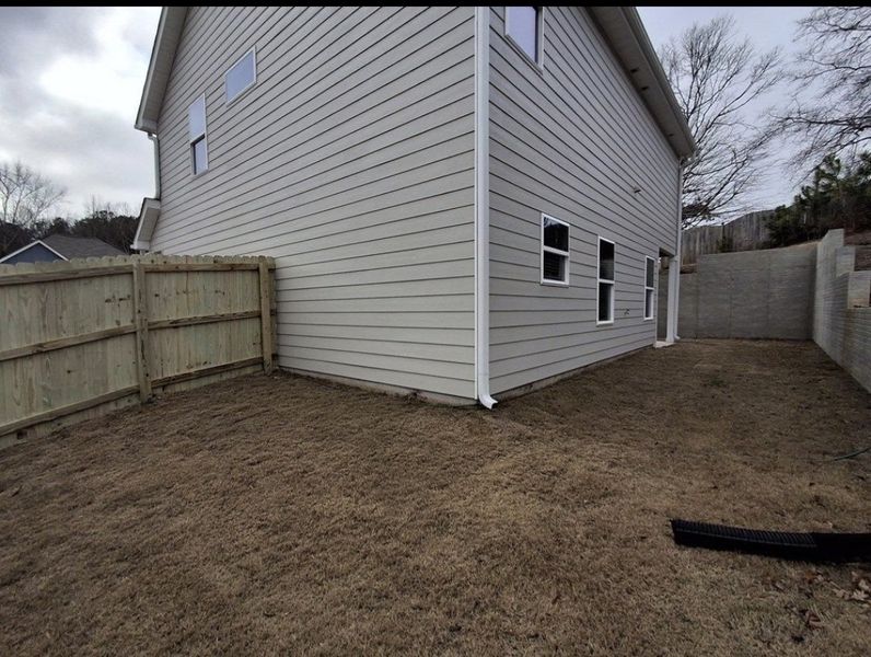 Exterior details and patio area of a home in Lake Shore, Temple (Image 27).