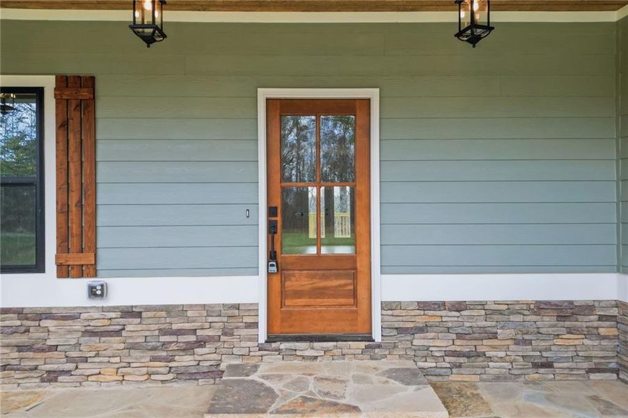 Exterior details and patio area of a home in , Ball Ground (Image 29).