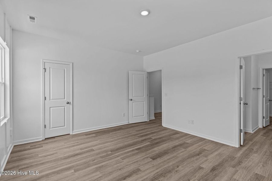 Spacious, unfurnished interior of a new home in Coastal Haven, Leland (Image 21). Spacious, unfurnished interior of a new home in Coastal Haven, Leland (Image 21).