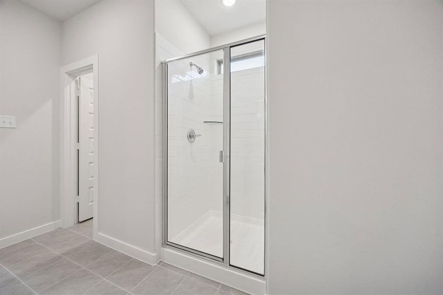 Primary Bathroom in the Oak II home plan by Trophy Signature Homes – REPRESENTATIVE PHOTO Primary Bathroom in the Oak II home plan by Trophy Signature Homes – REPRESENTATIVE PHOTO