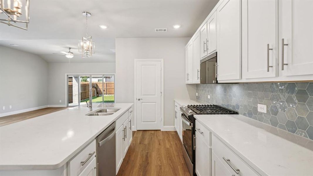 Photo is not of the actual home, but is an inspirational photo of builder’s model home and may depict options, furnishings, and/or decorator features that are not included.