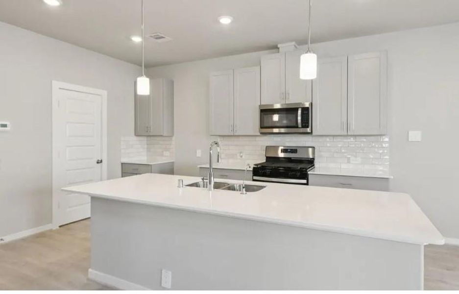 Photo is not of the actual home, but is an inspirational photo of builder’s model home and may depict options, furnishings, and/or decorator features that are not included