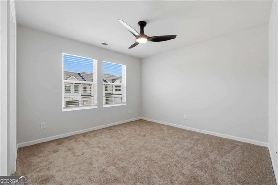 Spacious, unfurnished interior of a new home in The Grove At Mundy Mill, Gainesville (Image 20).