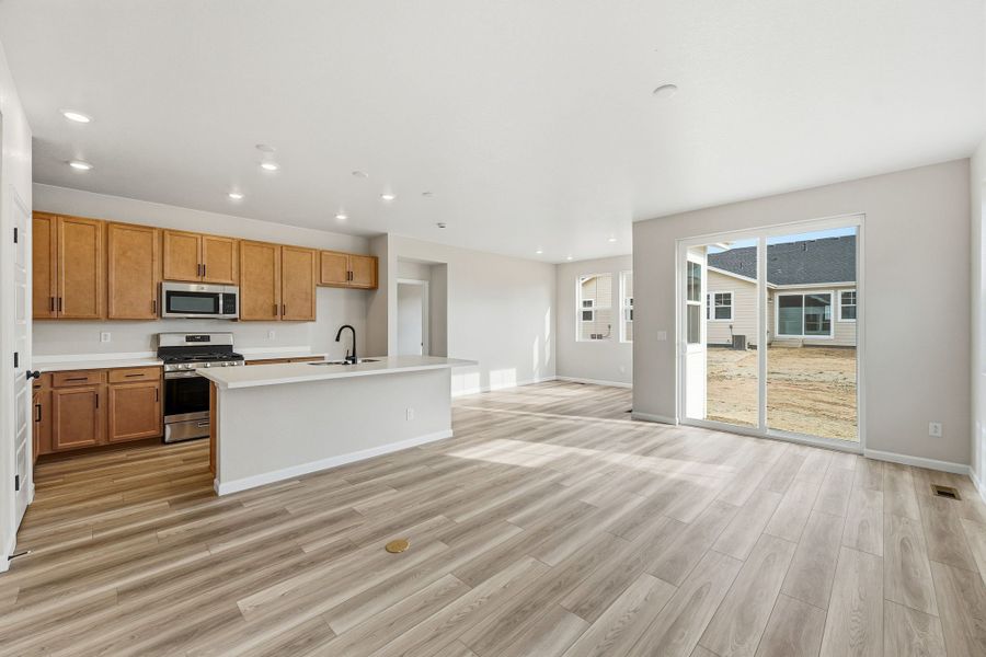 Furnished interior view inside a new home in The Aurora Highlands, Aurora (Image 4).